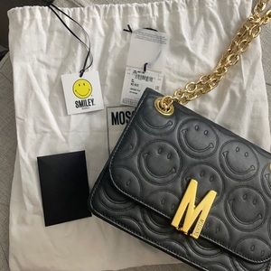 Moschino Smiley-Embossed leather shoulder bag
